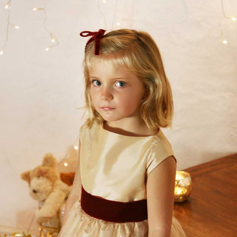 Elena gold and burgundy velvet christmas party dress for little girls by French UK designer Little Eglantine smiling