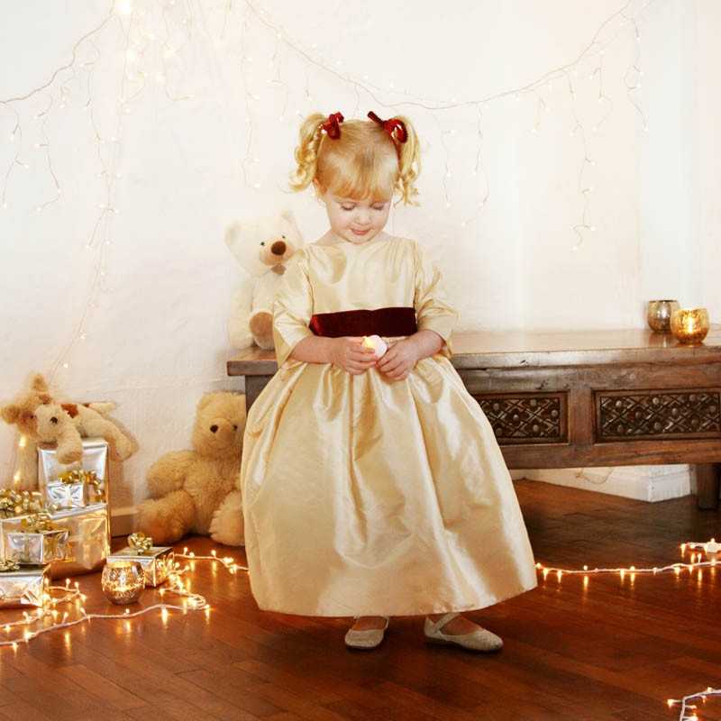 Ines gold and burgundy flower girl dress for Christmas and Winter wedding and parties by French UK designer Little Eglantine sit