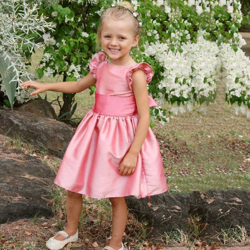 Isabella designer knee length flower girl dress with flounce sleeves in pink by French UK royal designer Little Eglantine