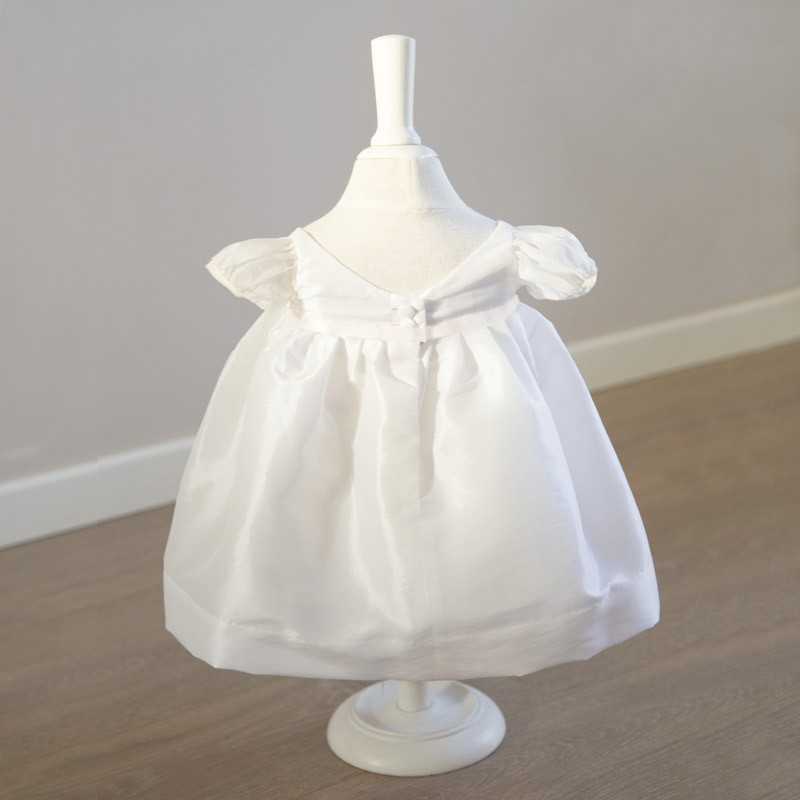 Suzie girl baby christening dress with silk organza puff sleeves and satin ribbon by designer Little Eglantine
