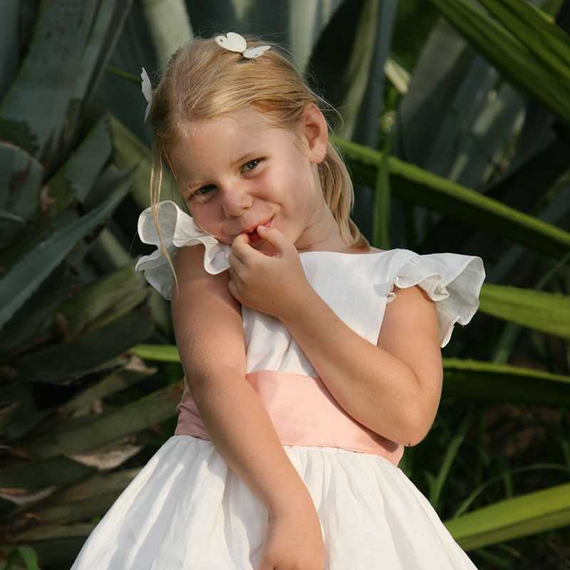 Felicity linen flower girl dress with flounce sleeves and deep back by Little Eglantine