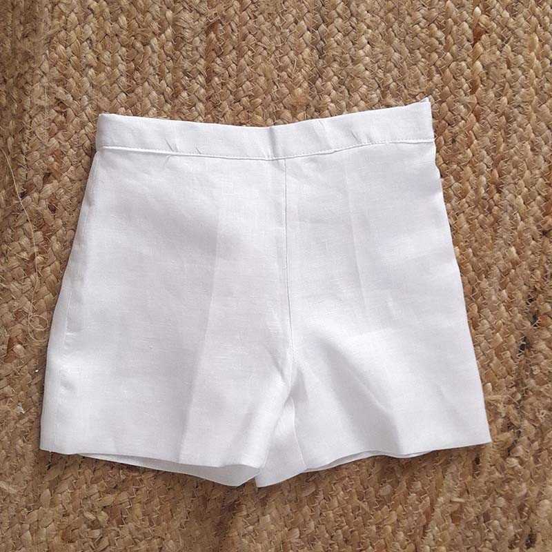 Off-white linen shorts for page boys and special occasions by French designer Little Eglantine