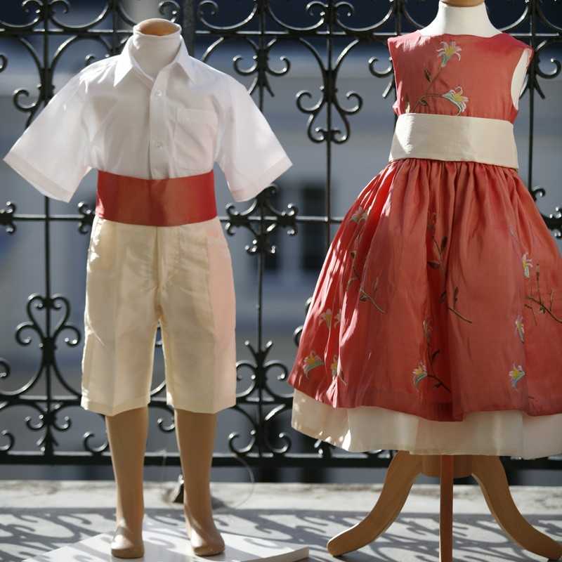 Ivory page boy French shorts with salmon pink cummerbund by royal maison de couture Little Eglantine