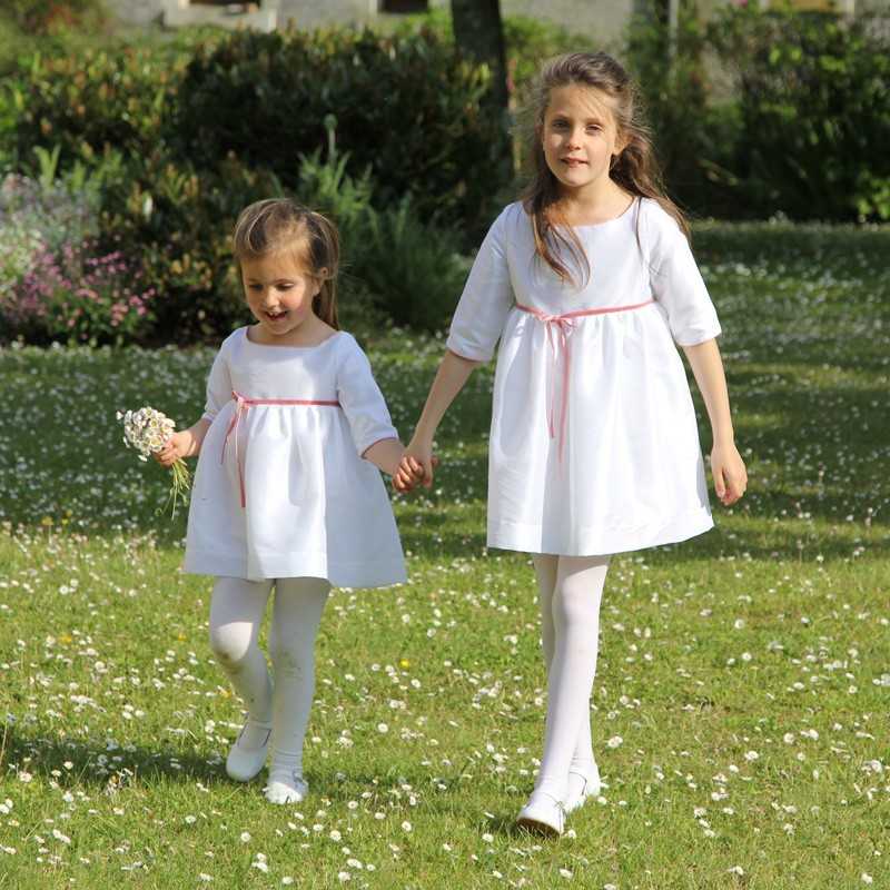 Amelie short girls party dress in white and pink for special occasions by French Royal designer Little Eglantine