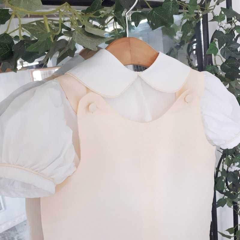 Ivory rompers for special occasions by Royal designer Little Eglantine - button detail