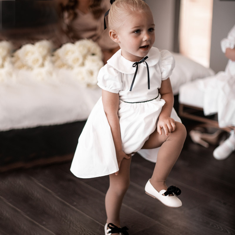 Myla short flower girl dress for black and white wedding theme by Little Eglantine