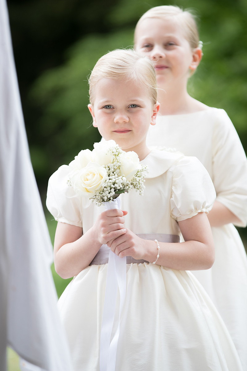 traditional ivory flower girl dresses with peter pan collar and puff sleevs by little eglantine