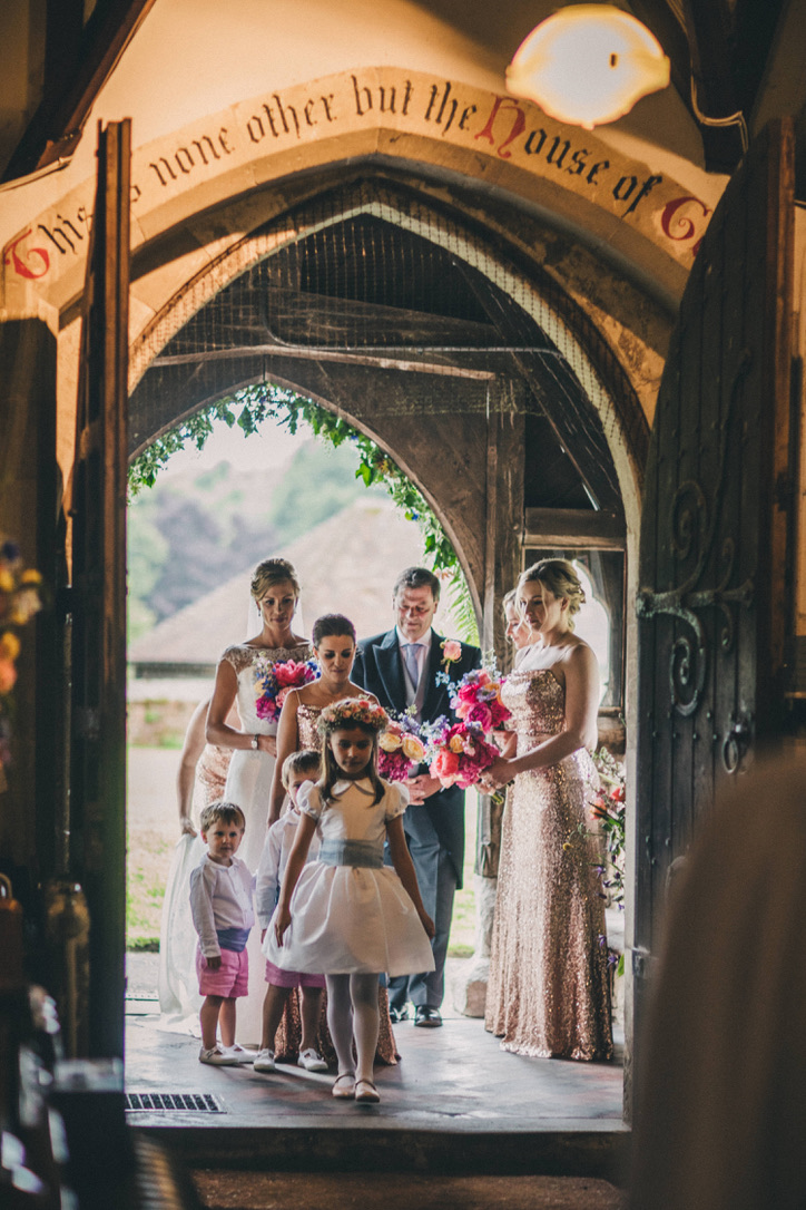 traditional page boy outfits and flower girl dresses in white, pale blue and pink for a countryside wedding by Royal French designer Little Eglantine